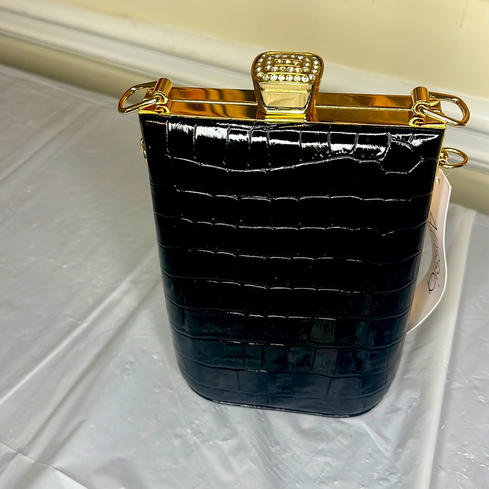 black crocodile clutch bag